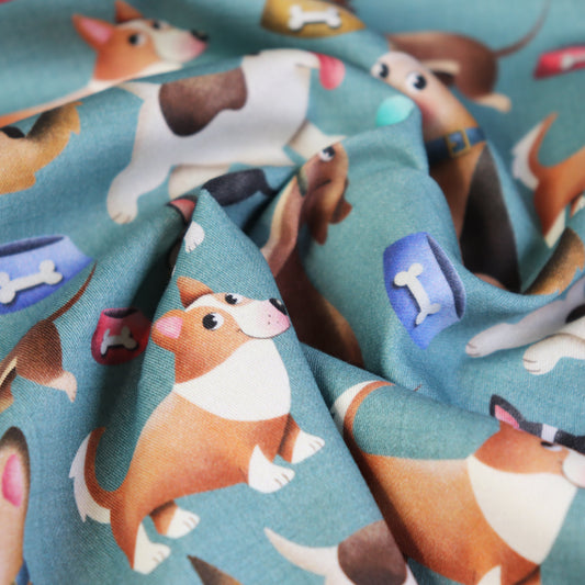 Tessuto in Raso di 100% Cotone: Cani di varie Razze su sfondo Celeste