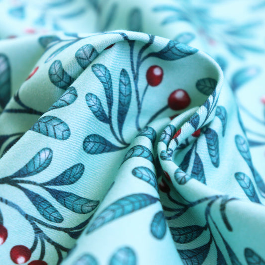 Tessuto in Raso di 100% Cotone: Bacche e Foglie su sfondo Verde Acqua