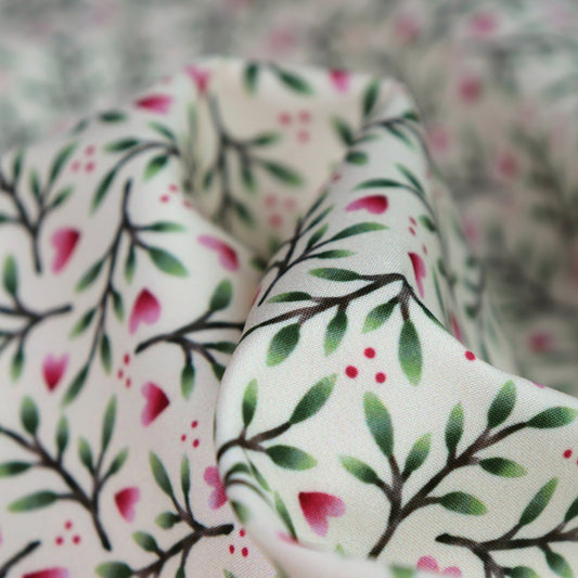 Tessuto SOFTSHELL impermeabile: Piante con piccoli cuori su sfondo beige chiaro