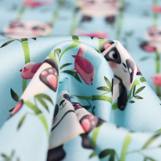 Tessuto in Raso di 100% Cotone: Panda su sfondo Celeste