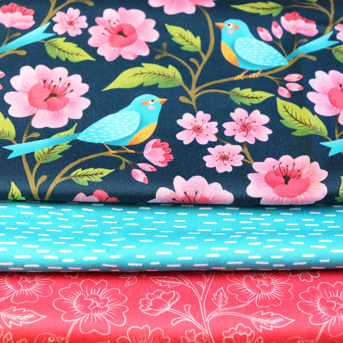 Set di 3 Tessuti Coordinati in Raso 100% Cotone: Uccellini Turchesi e Fiori Rosa su sfondo Blu scuro