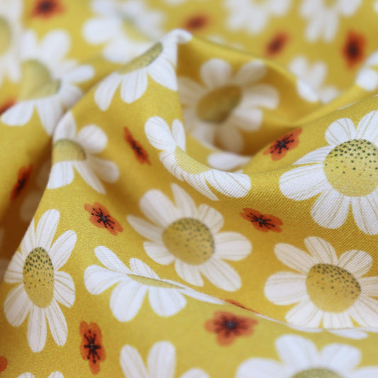 Tessuto in Raso di 100% Cotone: Margherite su sfondo Giallo