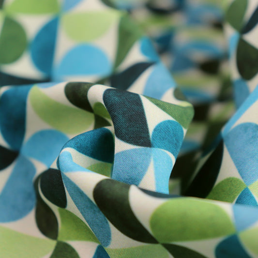Tessuto SOFTSHELL impermeabile: Stampa geometrica con semicerchi sul verde e blu