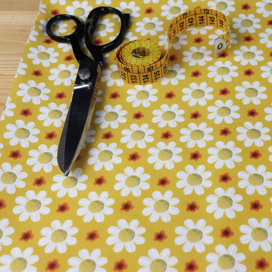 Tessuto in Raso di 100% Cotone: Margherite su sfondo Giallo